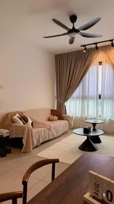 a living room with a bed and a ceiling fan at M Vertica KL Cheras Velocity KLCC View in Kuala Lumpur