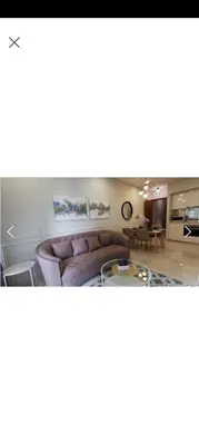 a living room with a couch and a table at Sky Suite By SmartWill Properties in Kuala Lumpur