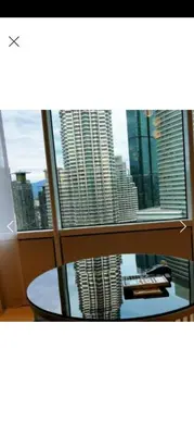 a view of a city skyline from a window at Sky Suite By SmartWill Properties in Kuala Lumpur