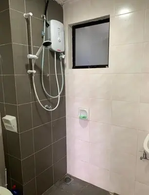 a bathroom with a shower with a window at Flora Residency Setapak in Kuala Lumpur