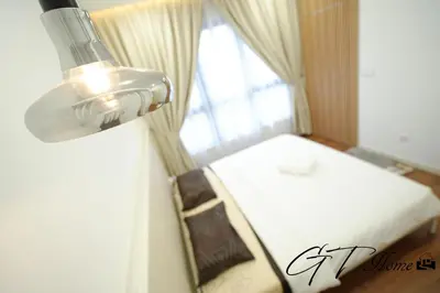 a bedroom with a white bed and a window at Gt home-Kuala Lumpur View 3Bedroom 2Bathroom in Kuala Lumpur