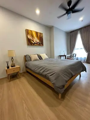 a bedroom with a bed and a ceiling fan at Arcoris SOHO Mont Kiara 2B2B, Home Stay in Kuala Lumpur