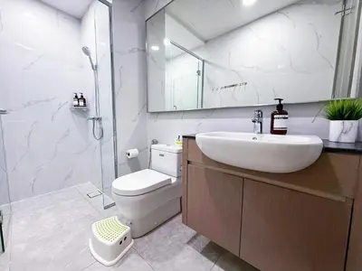 a bathroom with a sink and a toilet and a shower at Agile Delima Bukit Bintang in Kuala Lumpur