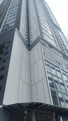 a tall building with a lot of windows at Agile Residence Near TRX in Kuala Lumpur