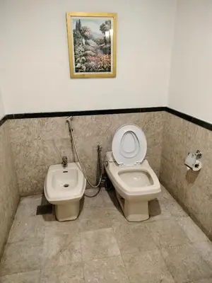 a bathroom with a toilet and a bidet at Homestay suite at times square KL in Kuala Lumpur