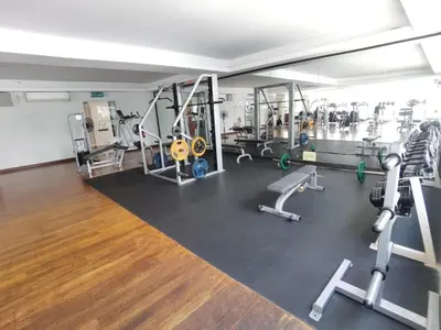 a gym with several treadmills and machines at Seri Bukit Ceylon Apartment Bukit Bintang in Kuala Lumpur