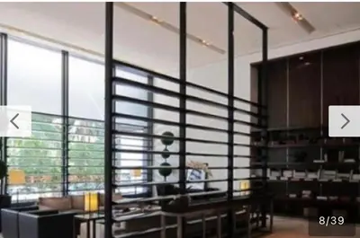 a room with a large window and a room with at Avenue K in Kuala Lumpur