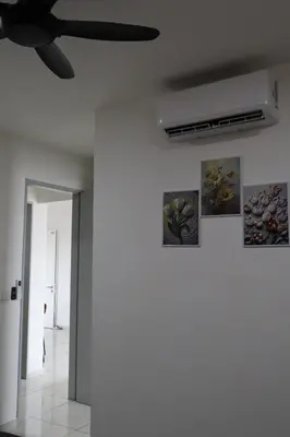 a ceiling fan with four paintings on a wall at COZY Kenwingston platz KL 2-5PAX Klcc View Pakin Nefix Free parkin 1807 in Kuala Lumpur