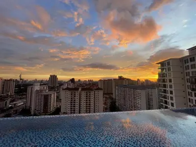 a view of a city from the rooftop of a building at The Nest Service Apartment in Kuala Lumpur