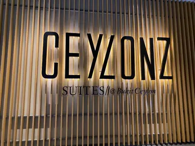 a sign that says calvy on the side of a building at Ceylonz Suites by Stayla in Kuala Lumpur