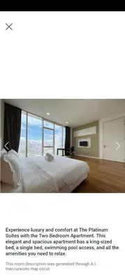 a bedroom with a large white bed with windows at The Platinum At Klcc Of SmartWill Holding in Kuala Lumpur