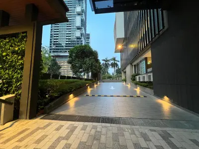 an empty street in a city with buildings at Manor Residence KLCC - LV Home in Kuala Lumpur