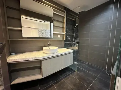 a bathroom with a sink and a shower at KLCC Expressionz Couple Suites 1B1B in Kuala Lumpur