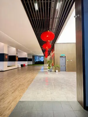 an empty lobby with red lanterns hanging from the ceiling at SS Luxury Suites AT TM Persiaran Stonor KLCC in Kuala Lumpur