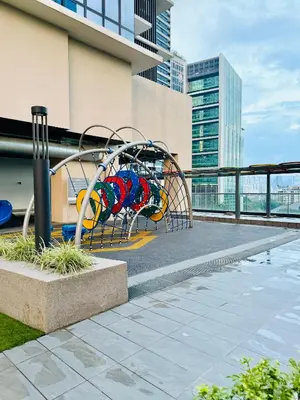 a playground with a slide in a city at SS Luxury Suites AT TM Persiaran Stonor KLCC in Kuala Lumpur