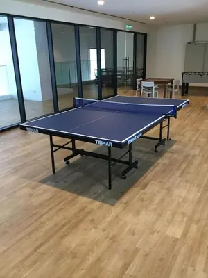 a ping pong table in a large room with glass at Mindful Bangsar Loft KL Sentral Mid Valley The Gardens Pasar Seni in Kuala Lumpur