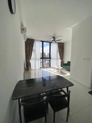 a black table and chairs in a living room at MAJESTIC RESlDENCE KLCC in Kuala Lumpur