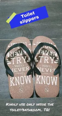 a pair of sandals with a black belt on them at Arte Ampang KLCC 2 BR Homestay, 4-6 pax in Ampang
