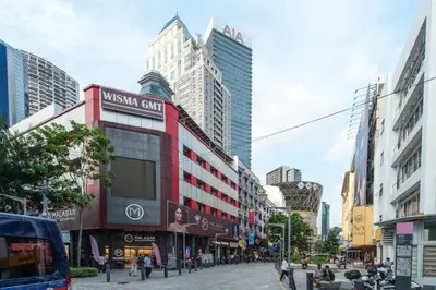 a street in a city with tall buildings at Hotel Wings Kuala Lumpur in Kuala Lumpur