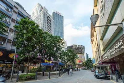 a street in a city with tall buildings at Hotel Wings Kuala Lumpur in Kuala Lumpur