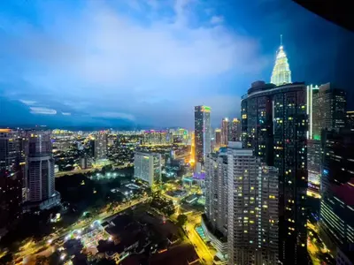 a view of a city at night at The Luxury Penthouse KLCC in Kuala Lumpur