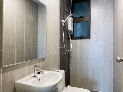a bathroom with a sink and a toilet at Cozy Stay at Legasi 5 minutes Walking distance to KLCC in Kuala Lumpur