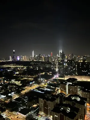 a view of a city at night with at Sweethome in Kuala Lumpur