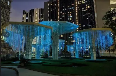 a display of blue lights in a city at night at Sweethome in Kuala Lumpur