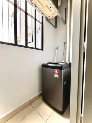 a small refrigerator in a room with a window at Kuala Lumpur, Sunway Velocity, M Vertica, 8-10Pax in Kuala Lumpur