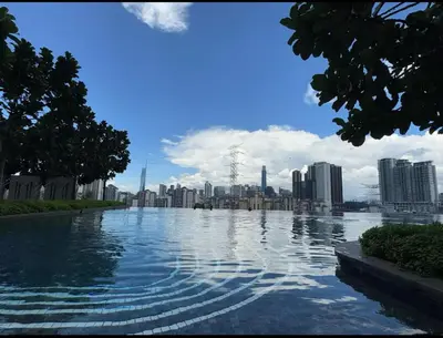 a large body of water with a city in the background at Kuala Lumpur, Sunway Velocity, M Vertica, 8-10Pax in Kuala Lumpur