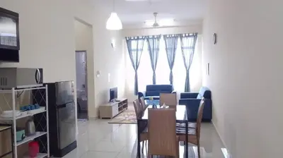a living room with a dining table and a kitchen at VUE RESIDENCE -3 ROOMs in Kuala Lumpur