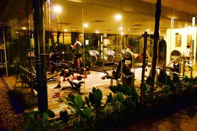 a group of people exercising in a gym at Summer Suites Studios in Kuala Lumpur