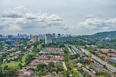 an overhead view of a city with buildings and trees at Dorsett Residences Sri Hartamas Free Parking by COBNB Mont Kiara Kuala Lumpur in Kuala Lumpur