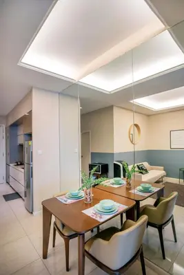 a dining room with a table and chairs at Dorsett Residences Sri Hartamas Free Parking by COBNB Mont Kiara Kuala Lumpur in Kuala Lumpur