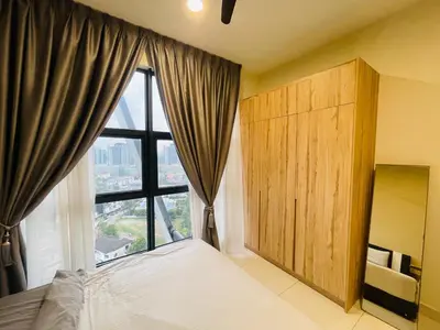 a bedroom with a bed and a large window at RuangWaktu at Arte Mont Kiara in Kuala Lumpur
