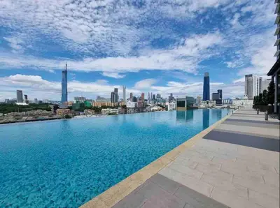 a view of the city from the rooftop of a building at Infinity Pool 7pax City Homestay KL Mrt Velo TRX in Kuala Lumpur