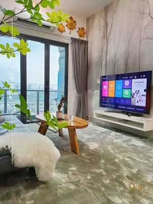 a living room with a large tv and a large window at Infinity Pool 7pax City Homestay KL Mrt Velo TRX in Kuala Lumpur