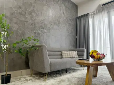 a living room with a couch and a table at Infinity Pool 7pax City Homestay KL Mrt Velo TRX in Kuala Lumpur