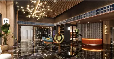 a lobby with a couch and a chandelier at Kuala Lumpur Luxury Suites By Majestic Residence in Kuala Lumpur