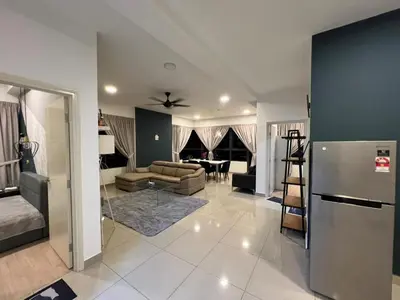 a large living room with a couch and a table at Jom Relax in Kuala Lumpur