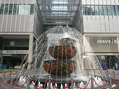 a water fountain in front of a building at Fahrenheit88Newly renovated 2mins Pavilion KL KLCC view in Kuala Lumpur
