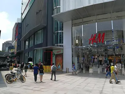 a group of people walking in front of a store at Fahrenheit88Newly renovated 2mins Pavilion KL KLCC view in Kuala Lumpur