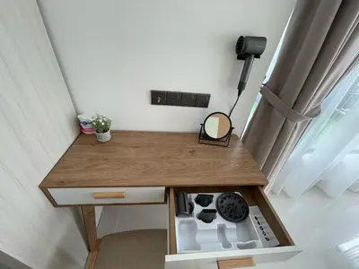 a small table with a sink in a room at Novo Suites Kuala Lumpur by Nestaway Jalan Ampang in Kuala Lumpur