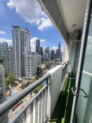 a balcony of a building with a view of the city at AL Seri Bukit Ceylon in Kuala Lumpur