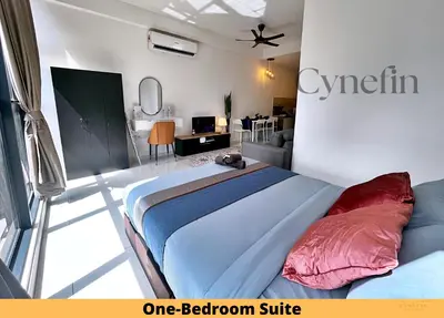 a bedroom with a bed and a living room at Majestic Residence Kuala Lumpur near Bukit Bintang & Chow Kit in Kuala Lumpur
