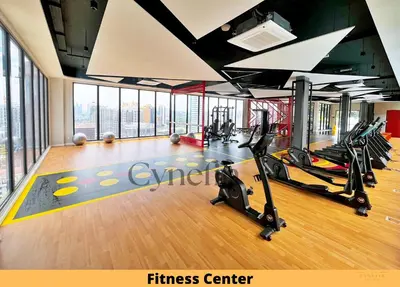 a gym with treadmills and ellipticals in a building at Majestic Residence Kuala Lumpur near Bukit Bintang & Chow Kit in Kuala Lumpur