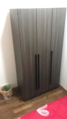 a large gray cabinet in a room with a wooden floor at Sentul Kuala Lumpur Private Medium Room Home Stay Shared Common Area With Host in Kuala Lumpur
