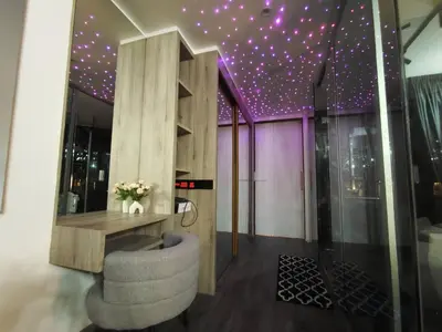 a room with a purple ceiling with stars on it at Dsir Lustful KL Jacuzzi NFLX Prjscn120 TV65 in Kuala Lumpur