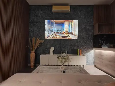 a bathroom with a sink and a picture on the wall at Dsir Lustful KL Jacuzzi NFLX Prjscn120 TV65 in Kuala Lumpur