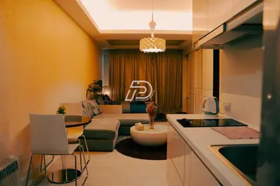 a living room with a couch and a table at Lux Studio Plaza Damas Kuala Lumpur KL in Kuala Lumpur